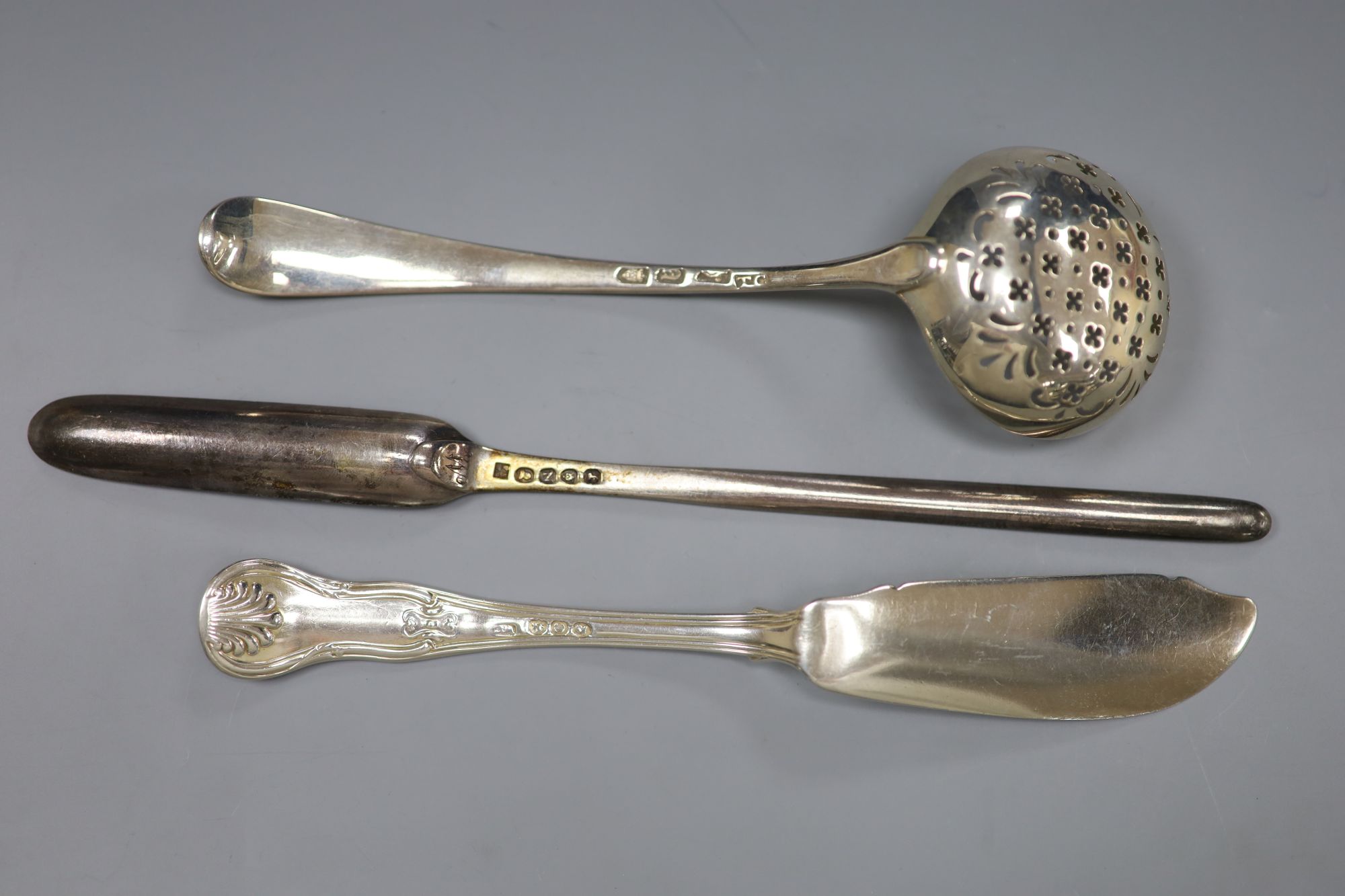 A George III silver marrow scoop, London, 1808, a silver butter knife and a George III silver sifter spoon, London, 1776, 4.5oz.